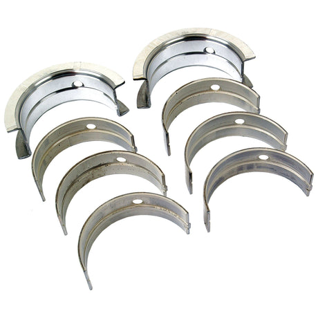 A set of eight semi-circular engine bearings, compatible with John Deere 1020, arranged in two rows. The Sparex Main Bearing Std. (Set), part number S.75842, features center holes and varying degrees of wear and finish. Perfect for those seeking high-quality Sparex replacements.