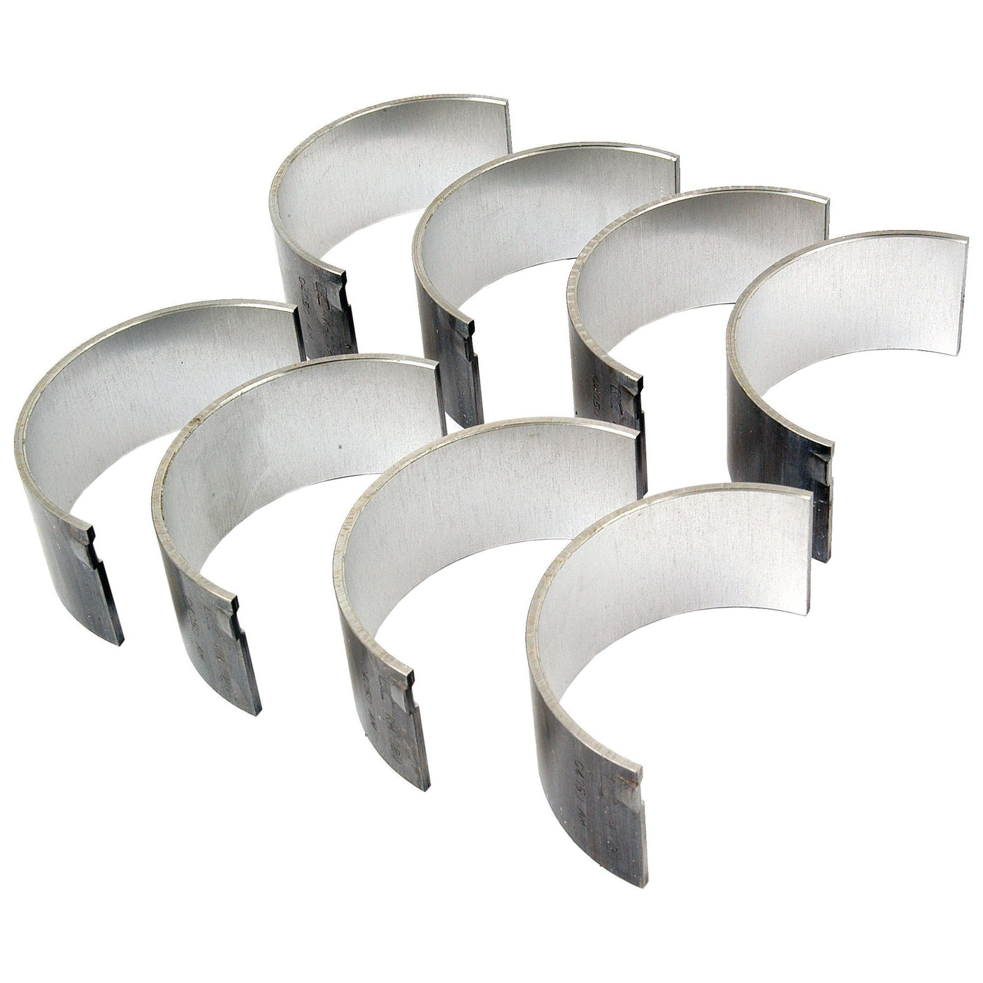 A set of seven silver engine bearings, the Conrod Bearing +0.020'' (0.50mm) Set by Sparex (Sparex Part No.S.75994), reminiscent of those used in David Brown and International Harvester machinery, arranged in a semi-circular fashion against a white background.