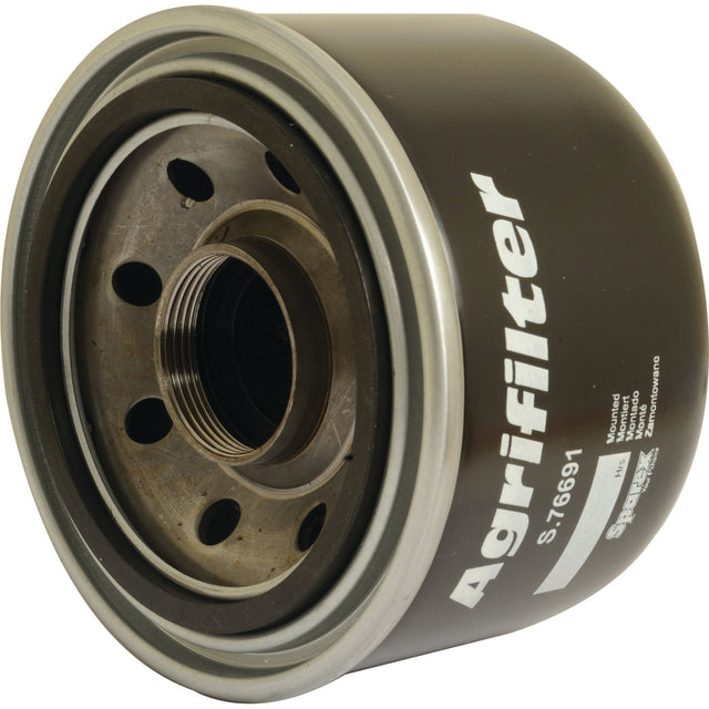 Close-up of the Sparex Hydraulic Filter - Spin On, part number S.76691, showcasing its black cylindrical body with a threaded center and multiple openings. Designed for Massey Ferguson machinery, this hydraulic filter ensures optimal performance and reliability.