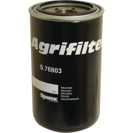 A black Hydraulic Filter - Spin On, model S.76803 from Sparex, designed for agricultural machinery. This filter features labeling in multiple languages and the Sparex brand logo. It is compatible with New Holland and also fits Case IH models.