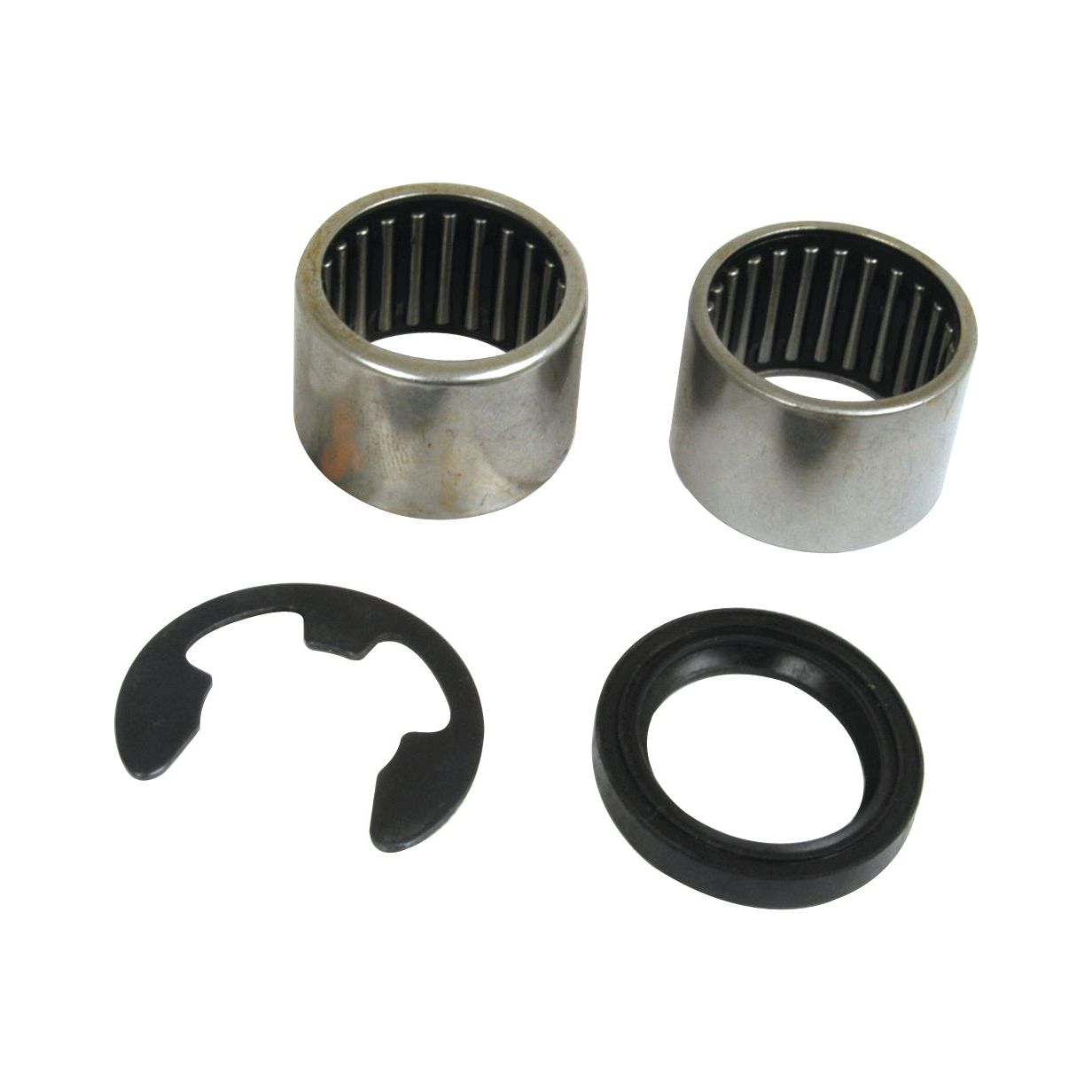 Two metallic needle bearings, a black rubber seal, and a metallic circlip arranged against a white background, resembling precision components from the Coulter Hub Repair Kit (Kverneland), Sparex Part No.S.78469 by Sparex.