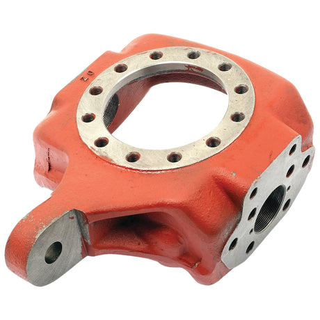 A red metallic mechanical part with multiple holes and a circular opening in the center, reminiscent of the robust engineering found in Case IH equipment; this describes the Axle Housing (Sparex Part No. S.7859) by Sparex.