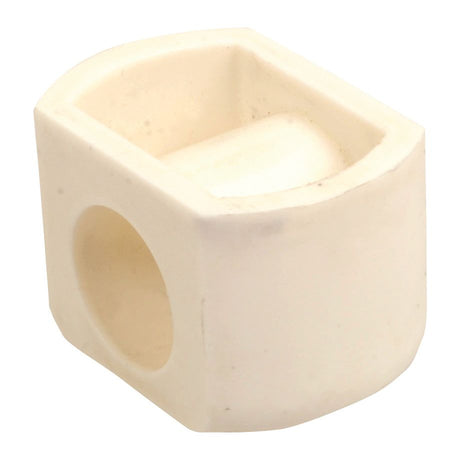 A white, rectangular plastic object with a cylindrical hole through one side and a square recess on top, resembling the Nylon Bush (Sparex Part No. S.79713) by Sparex, designed to fit as TH93.