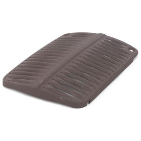 A brown rectangular silicone drying mat with raised ridges for airflow is displayed, much like the AGCO Massey Ferguson - Front Grille 35/35X - 826812M91 in its simplicity and functionality.
