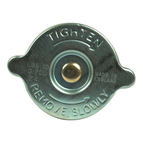 Top view of the Sparex Radiator Cap - S.8454 with text instructing to "TIGHTEN" on one side and "REMOVE SLOWLY" on the other. The cap includes pressure details, specifically 10 psi, and has "MADE IN ENGLAND" engraved.