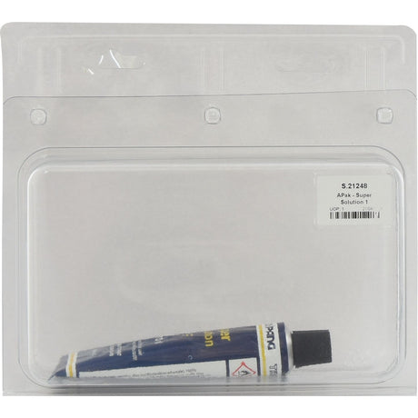 A small tube of APak - Super Solution 1 (Sparex Part No.S.21248) from the brand Sparex is packaged inside a transparent plastic clamshell container, with a label containing product information attached to the packaging.