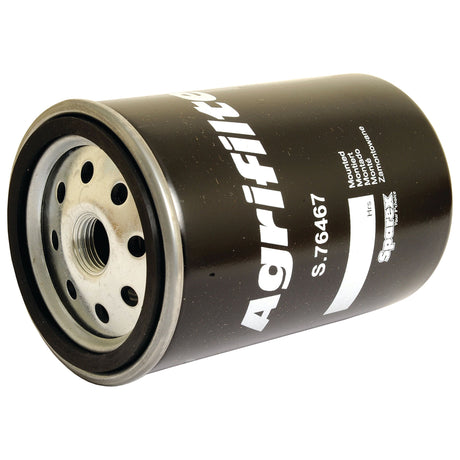 A black cylindrical Sparex oil filter, labeled with "Agrifilter" and the model number "S.76467," is designed to function as a spin-on fuel filter. It features multiple small holes around a central threaded inlet, making it suitable for Valmet & Valtra engines.
