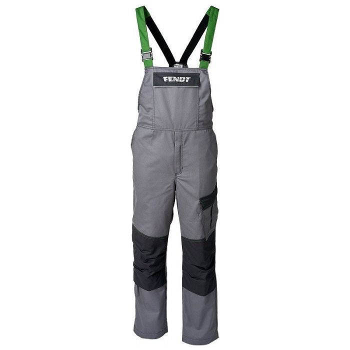 The AGCO Fendt Bib and Brace (X991018029) features grey and black overalls with green suspenders, multi-purpose pockets, a front zip pocket, reinforced knee panels, and the word "Fendt" above the chest pocket.