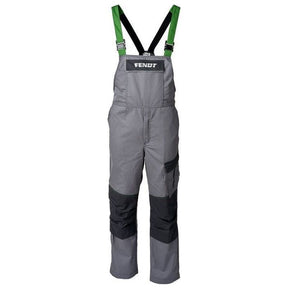 The AGCO Fendt Bib and Brace (X991018029) features grey and black overalls with green suspenders, multi-purpose pockets, a front zip pocket, reinforced knee panels, and the word "Fendt" above the chest pocket.