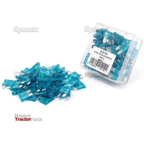 A small pile of blue Blade Fuses sits next to a clear plastic box filled with more of the same, labeled "Blade Fuse 15A, 50 pcs. Agripak | Sparex Part No.S.5119".