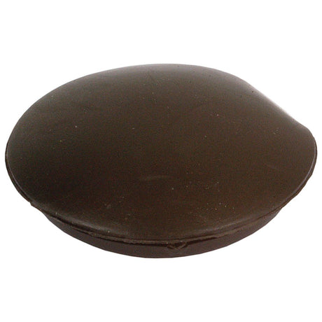 A round, dark-colored confectionery item with a smooth, slightly domed surface resembling a Blind Grommet Ø3/4'' x 1/16'' Groove (Sparex Part No. S.11347) from Sparex.
