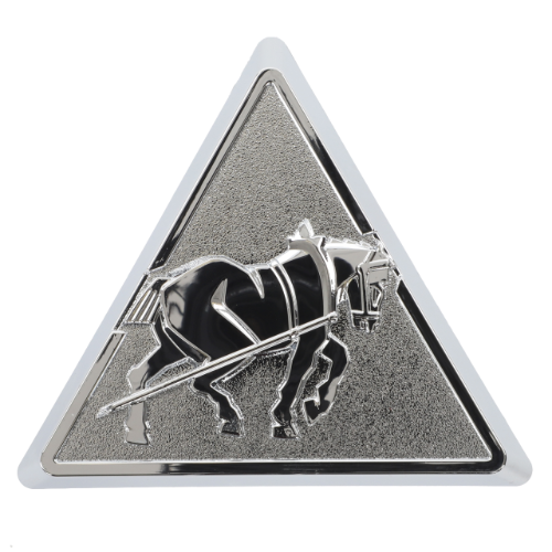 AGCO's Fendt - Bonnet Badge (930500022882) is a triangle-shaped metal emblem featuring a raised depiction of a horse pulling a plow in the center, set against a textured background, making it an ideal fit for Fendt Vario Models.