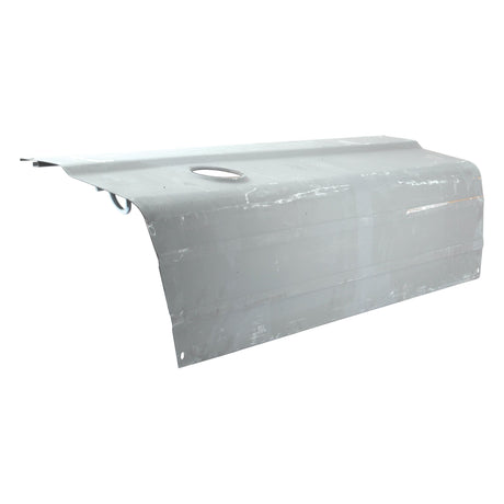 A grey, rectangular metal sheet with a circular cutout on the upper left side, featuring slight scratches and bends, often used as Sparex Bonnet - LH (Sparex Part No. S.61486) material in Ford New Holland tractor parts.