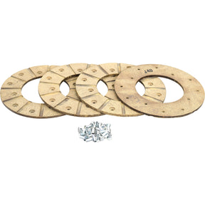 On a white background, there are four circular brake lining kit discs along with a pile of matching screws. The Sparex Brake Lining Kit Discs (Part No.S.13975) have a pattern of notches and holes, resembling those used in International Harvester machinery. The outer diameter of each disc is 165mm.