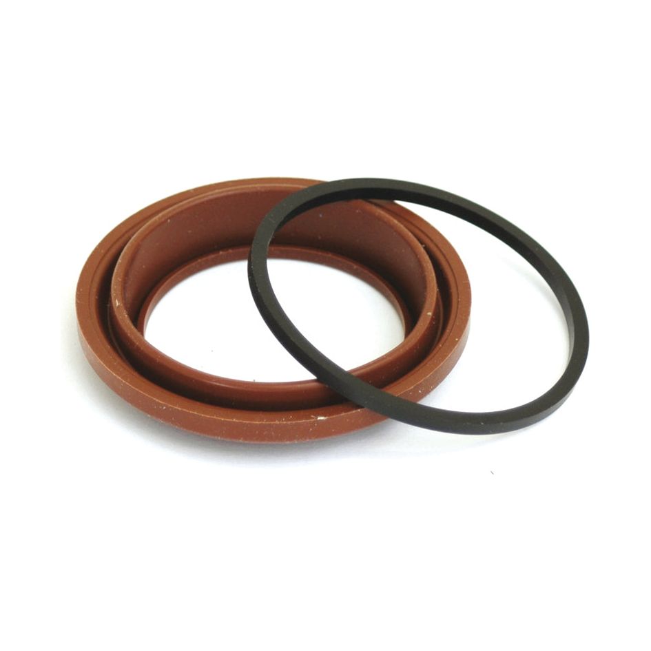 Two rings, one brown and the other black, designed similarly to the components found in a Brake Slave Cylinder Repair Kit from Sparex (Part No. S.38088), are positioned side by side on a white background.