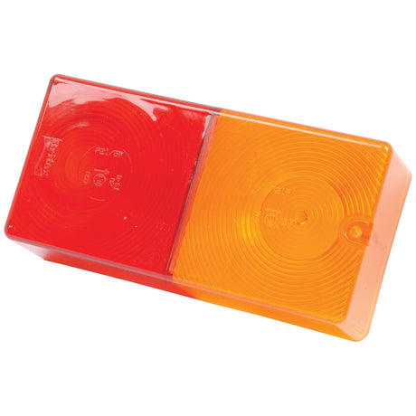 Introducing the Replacement Lens from Sparex (Part No. S.21246), an ideal fit for your rear light assembly (S.21244). This rectangular, dual-colored polycarbonate lens features a left half in red and a right half in amber, both designed with concentric circular patterns for enhanced visibility and style.
