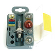 The Bulb Reserve Pack 12V / H7 (Sparex Part No. S.31129) by Sparex is a compact automotive kit that includes a variety of 12V light bulbs, such as H7 halogen bulbs, along with an assortment of fuses, all neatly organized in a gray plastic case with a clear lid.