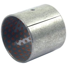 The Bush (Sparex Part No. S.43334) by Sparex is a cylindrical metal bushing, perfect for Drive Shaft assemblies, featuring a small hole on the outer surface and a perforated inner surface. This component is compatible with Massey Ferguson machinery and stocked by Sparex.