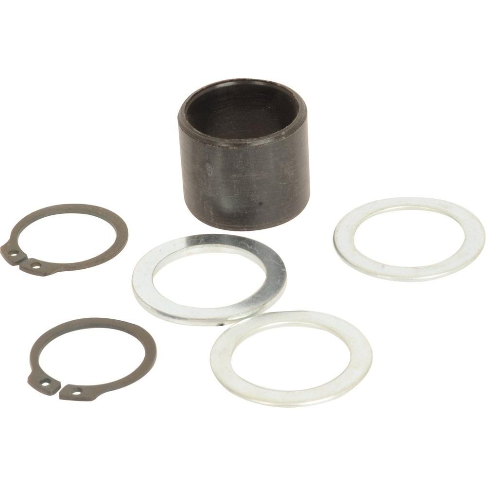 Different types of metal washers, circular clips, and a cylindrical spacer are laid out on a white background, ready for steering pin repairs in Case IH and Fiat machinery. Among these components is the Sparex Bush (Sparex Part No.S.57031), known for its reliable performance.