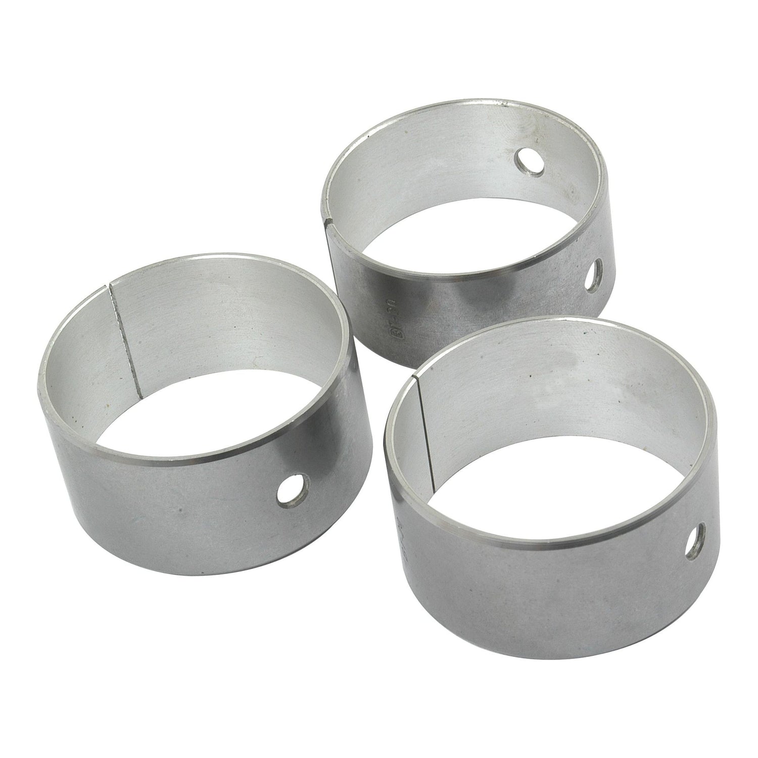 Three silver cylindrical metal rings with small holes and a slit on one side, arranged in a triangular formation, resembling parts of the Sparex Camshaft Bush Kit (S.62121).