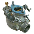 A metal carburettor featuring various screws and bolts, designed for controlling the air-fuel mixture in an internal combustion engine, compatible with Ford / New Holland models. Sparex part number S.69196.