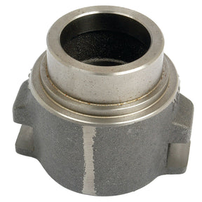 A Carrier - Clutch Release Bearing, Sparex Part No. S.66932, is a metallic cylindrical mechanical part with a hollow center, rough exterior surface, and small protruding tabs on the side, resembling a release bearing often found in Ford/New Holland machinery.