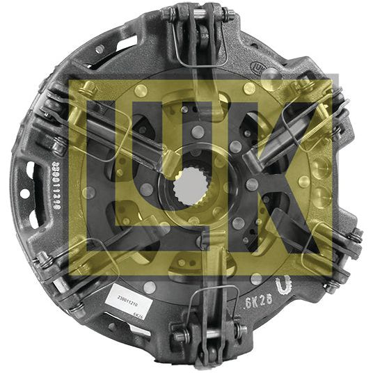 A metal clutch cover assembly, model S.135596, with visible gear teeth and mechanical components, featuring a large yellow and black "Sparex" logo overlay. Suitable for various vehicle models, this expertly manufactured part ensures reliable performance.