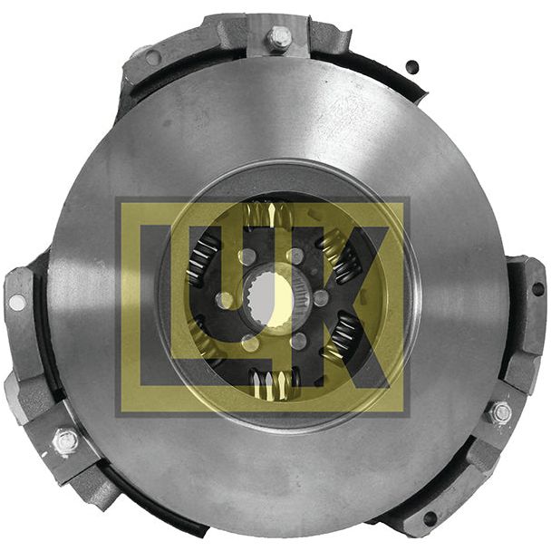 Close-up image of the Clutch Cover Assembly - S.145218 by Sparex, showcasing a mechanical flywheel with a metal center, mounted on a cast iron housing with visible gears and rivets.