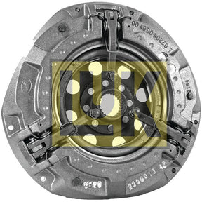 A robust cast iron Clutch Cover Assembly - S.145424 from the Sparex brand, featuring a metallic automotive clutch pressure plate adorned with a yellow logo displaying the letters "LUK" prominently at its center.