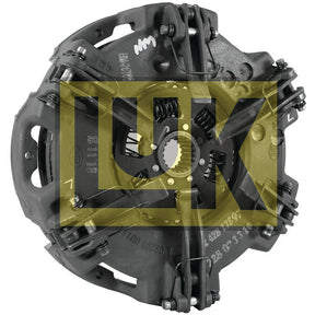 A black Clutch Cover Assembly - S.156475 by Sparex, featuring the yellow LUK logo on it. The assembly includes multiple springs, a central hub with gear teeth, and an optimized cover size designed for enhanced performance.