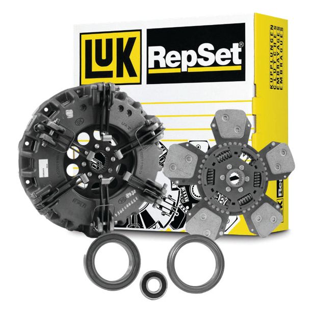 Image of a Sparex Clutch Kit with Bearings - S.127338, featuring various components such as a clutch disc, pressure plate, release bearing, flywheel bearing, and alignment tool, displayed in front of the packaging box.