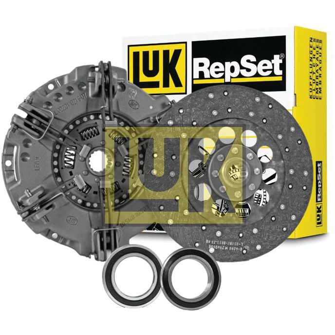 The Sparex Clutch Kit with Bearings - S.131128 is displayed with two black seals, an organic captive disc, a clutch disc, and a pressure plate, set against the product's branded packaging.