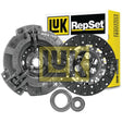 A Sparex clutch kit with bearings (S.146555) featuring an organic disc, a clutch cover, a release bearing, and a yellow and black branded box in the background.