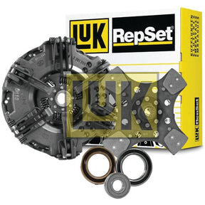 A Clutch Kit with Bearings - S.146634 by Sparex, featuring cerametallic components such as a clutch disc, pressure plate, and bearings, positioned in front of its packaging box.
