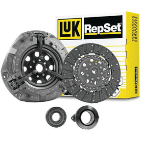 A Sparex Clutch Kit with Bearings - S.146898, which includes an organic disc, a pressure plate, and release bearings, is displayed in front of the product's packaging.