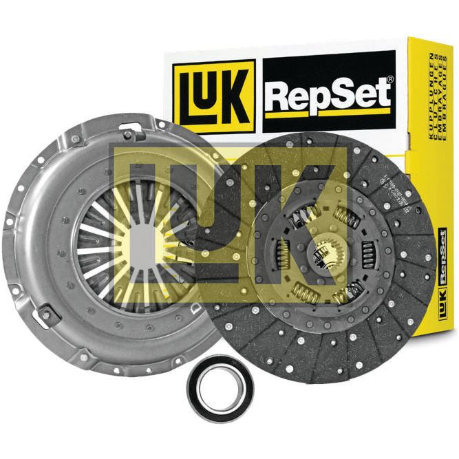 A Sparex Clutch Kit with Bearings - S.147338, which includes a pressure plate, clutch disc, and release bearing, displayed in front of the product packaging box features pressed steel components for enhanced durability.