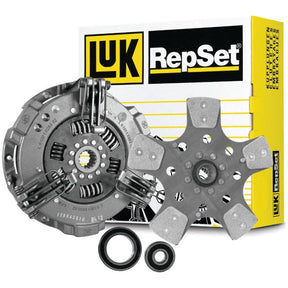 A Sparex Clutch Kit with Bearings - S.153716, featuring various metallic components such as a pressure plate, clutch disc, and seals, is displayed in front of a branded yellow and black box that underscores its reliable cover type.