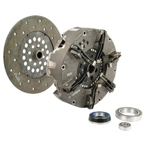 A Sparex Clutch Kit with Bearings - S.73067, featuring a cerametallic disc, pressure plate, and several bearings, is displayed on a white background.