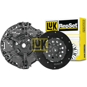 Two automotive clutch components, crafted with organic materials, placed in front of a Sparex branded box for the Clutch Kit without Bearings - S.131150.