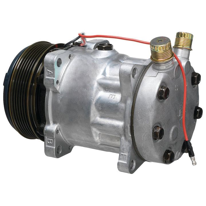 Close-up of the Sparex Compressor (SD7H15) - S.106714, a metal automotive air conditioning compressor with connected wiring and two brass fittings on top, suitable for various vehicle models.