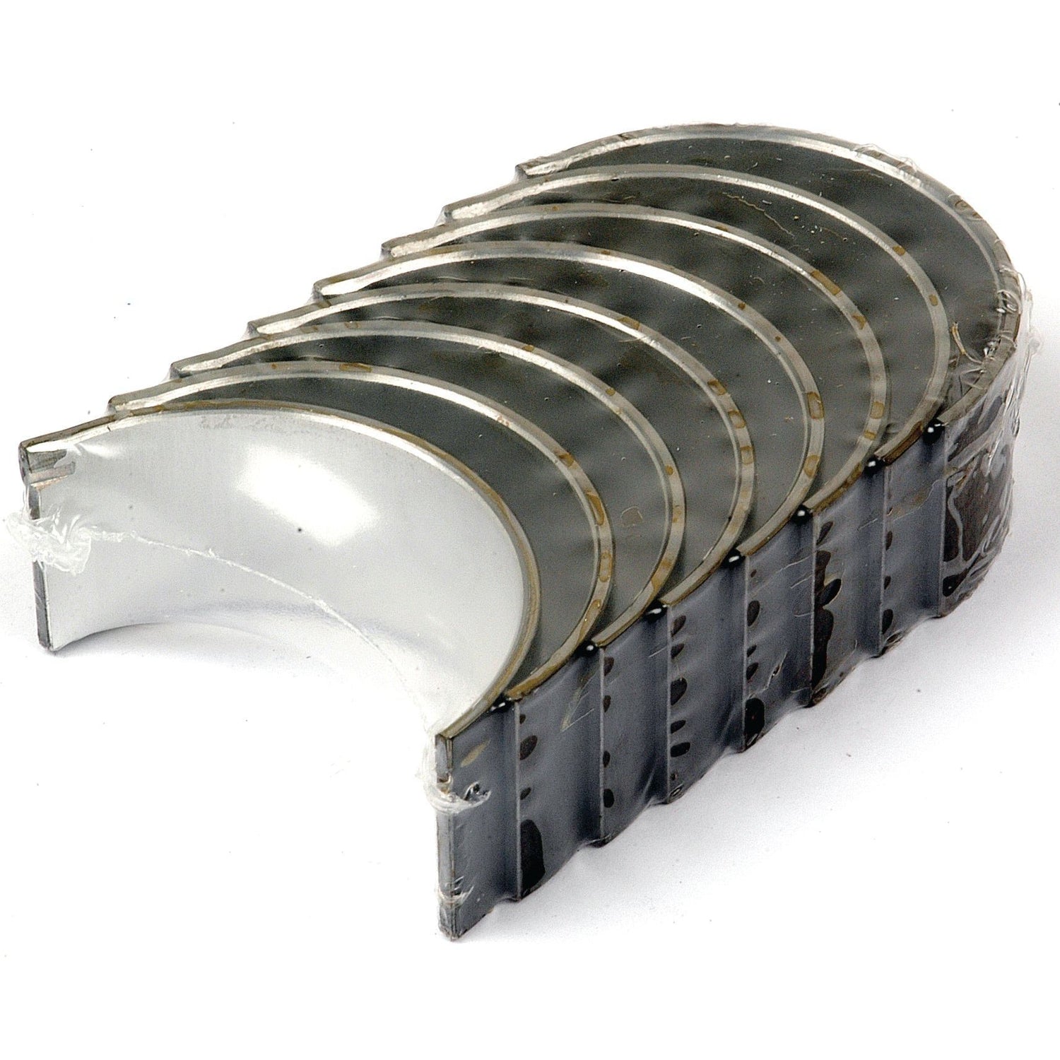 A set of Conrod Bearings +0.010'' (0.25mm), known for their reliability and durability, are arranged in a semi-circular formation. Ideal for Massey Ferguson and Landini tractors, these Sparex Part No.S.42360 bearings are commonly used in internal combustion engines.