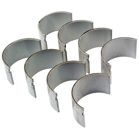 A set of eight semi-circular metal engine bearings, ideal for Sparex and Case IH machinery, arranged in two rows against a white background. They are identified as the Conrod Bearing +0.020'' (0.50mm) Set under Sparex Part No.S.57652 and branded by Sparex.