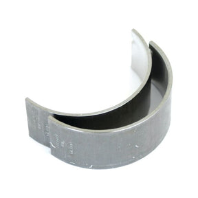 A pair of Sparex Conrod Bearing +0.030'' (0.75mm) (Sparex Part No.S.72110) bearings placed side by side on a white background. These crescent-shaped bearings feature a smooth inner surface and are compatible with John Deere engines.
