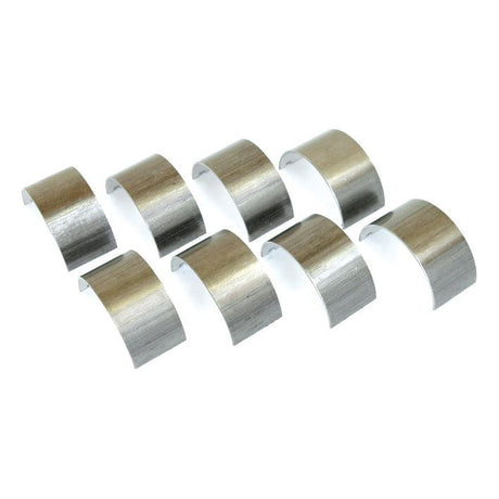 Image shows eight Sparex Conrod Bearings +0.040'' (1mm) Set, arranged in two rows of four, curved in shape and metallic in color. These Ford / New Holland compatible parts are precisely designed to meet your machinery's needs. Reference code: 703F6211BFA.