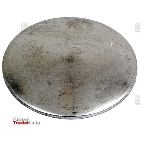 A round, flat mild steel disc with a smooth, slightly worn surface. The image includes a watermark reading "Sparex" and a logo for Massey Tractor Parts in the bottom left corner. This dished type core plug (Core Plug - 2'' Dished Type - Mild Steel | Sparex Part No.S.19177) exemplifies durability and precision engineering from the trusted brand Sparex.
