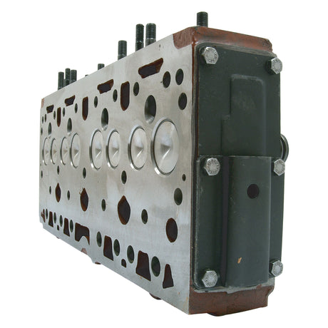 A close-up view of the Cylinder Head Assembly - S.42496 from Sparex, showcasing visible bolts, piston openings, and smooth machined surfaces. Valves and springs are also intricately detailed within the assembly.
