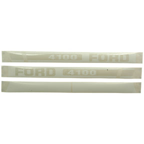 Three white vinyl decals featuring the word "FORD" and the number "4100" in block letters on a transparent background, perfect for Ford / New Holland 4100 enthusiasts, can be found as part of the Decal Set by Sparex (Sparex Part No.S.8416).