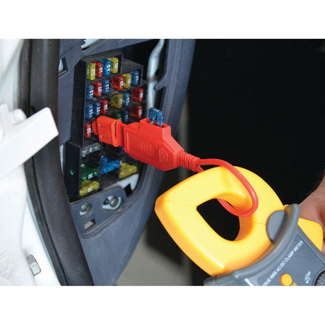 The Diagnostic test lead set - S.151759 by Sparex is connected to a fuse box, likely in a vehicle, using connection leads to measure electrical parameters.