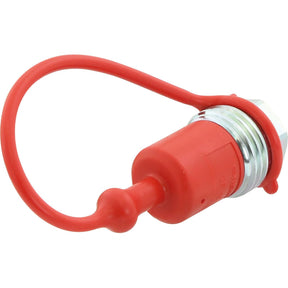 Close-up of a red dust cap connected to a metallic threaded connector secured by a flexible red tether, resembling the quality of the Sparex Faster Dust Cap Red PVC Fits 1/2'' Male Coupling - TF Series TF12R - S.112765.