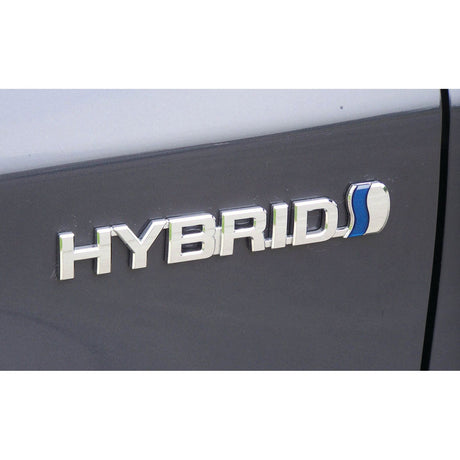 Close-up of a car's "HYBRID" badge on a gray exterior, featuring a blue and silver emblem, reflecting the precision you'd expect from the Sparex Electrical Voltage Tester - S.151758.